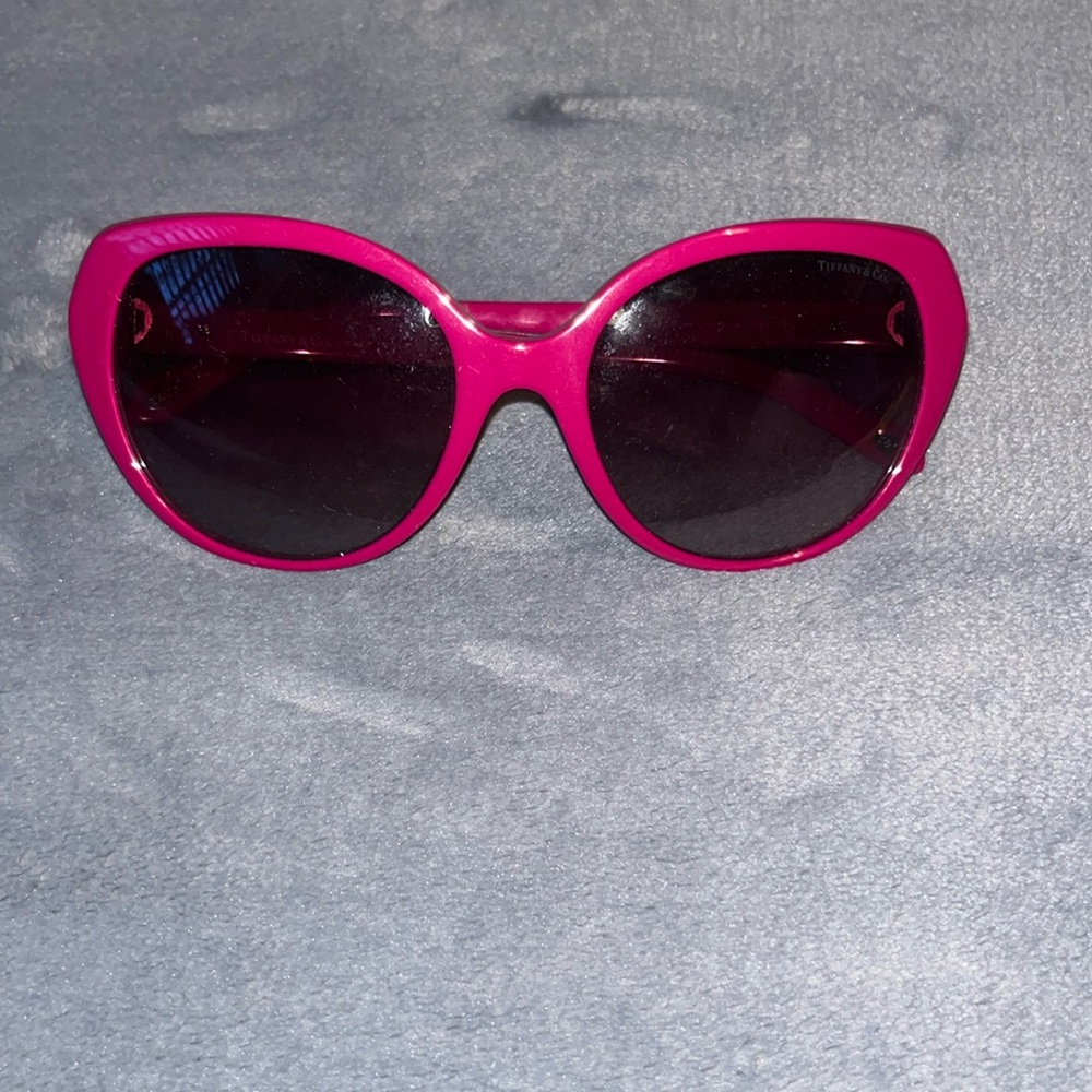tiffany and co. sunglasses. pink color with teal hearts on the sides
